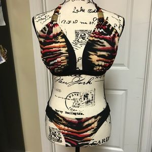 Venus bikini top is DDD and bottoms are 10.
